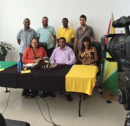 In photo, Director of Fly Jamaica, Roxanne Reece (sitting at left) and Director of Tourism Indranauth Haralsingh (seated at centre) are flanked by the five chefs. 