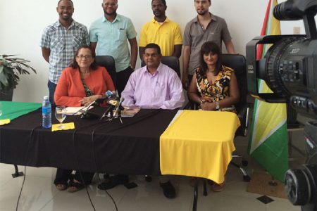 In photo, Director of Fly Jamaica, Roxanne Reece (sitting at left) and Director of Tourism Indranauth Haralsingh (seated at centre) are flanked by the five chefs. 