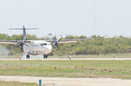 Touchdown: The LIAT ATR72 touched down yesterday at the Ogle International Airport in Guyana for the first time. It is the largest passenger commercial plane to date to land at the airport. The aircraft, which can accommodate 68 persons, brought 44 passengers yesterday to Guyana. Ogle Airport Inc representative Kit Nascimento said that the company was pleased that the airport, whose certification has been upped to a Code C Airport, can now accommodate large aircrafts like the ATR72. (Photo by Arian Browne)