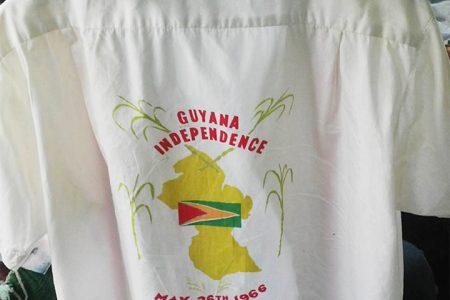 How many people can say they’ve kept a shirt for 48 years? The owner of the shirt in the photo above is 84-year-old Kitty resident, Yuli Gooding. It was made by the now defunct Windsor Shirt Factory that was located on the East Coast Demerara, in commemoration of Guyana’s independence. Gooding said it was bought sometime between the May 22 and May 24, 1966; he cannot remember what the price was. He said he and quite a few others wore their Independence shirts on the first flag raising night. (Photo by Dacia Whaul)

