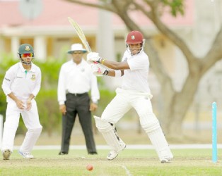 Leon Johnson gathers runs through the offside during his valuable half century yesterday. (Photo courtesy of WICB media) Randy Brooks of Brooks/La Touche photography 