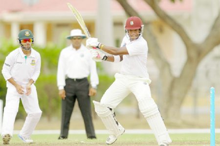 Leon Johnson gathers runs through the offside during his valuable half century yesterday. (Photo courtesy of WICB media) Randy Brooks of Brooks/La Touche photography