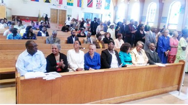 This photo shows Guyanese and other members of the Parish of St. Gabriel’s Church during the Communion period.  L to R: Bobby Vieira (broadcaster), Ave Brewster-Haynes (former General Manager of the GBC), Molly Berry – Executive Officer at the Guyana Consulate New York, Gloria Robertson - Sister of President Donald Ramotar,  Yvonne Marcus – Member of the Guyana Tri-State Alliance, Pat Jordon-Langford – President of the Guyana Tri-State Alliance, Claire Goring – Cultural Director of the Guyana Cultural Association of New York & Guyana’s Consul General in New York – Brentnol Evans.    