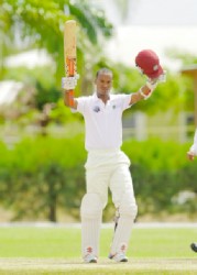 Kraigg Brathwaite of the High Performance Centre XI celebrates reaching his century yesterday, the third day of the four day match against Bangladesh A  at the Windward Sports Club in Barbados yesterday. Photo by WICB media/Randy Brooks of Brooks La Touche photography. 