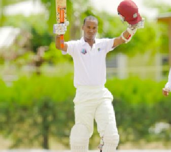 Kraigg Brathwaite of the High Performance Centre XI celebrates reaching his century yesterday, the third day of the four day match against Bangladesh A  at the Windward Sports Club in Barbados yesterday. Photo by WICB media/Randy Brooks of Brooks La Touche photography.

