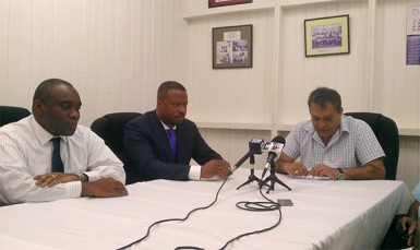 GPHC Chief Executive Officer Michael Khan (right) responds to question from the media yesterday with St. Kitts and Nevis Health Minister Mark Brantley (centre) and John Essien, Medical Chief of Staff, Alexandra Hospital Nevis.  