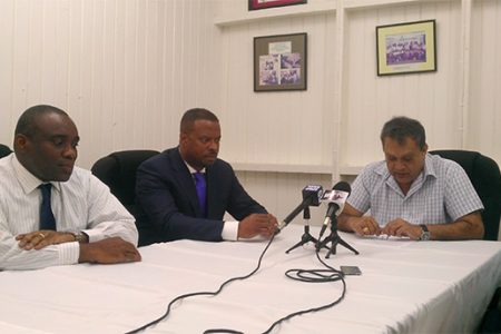 GPHC Chief Executive Officer Michael Khan (right) responds to question from the media yesterday with St. Kitts and Nevis Health Minister Mark Brantley (centre) and John Essien, Medical Chief of Staff, Alexandra Hospital Nevis.
