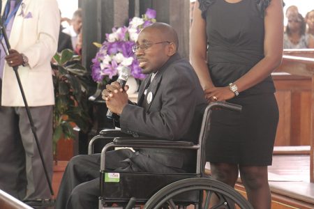 A friend paying homage to Lawrence Williams at his funeral service on Saturday at the St George’s Cathedral. 