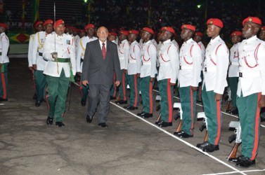President Donald Ramotar inspecting the Guard of Honour at the 48th Independence celebrations at the National Park last night. (GINA photo)