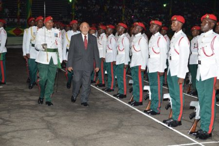 President Donald Ramotar inspecting the Guard of Honour at the 48th Independence celebrations at the National Park last night. (GINA photo)