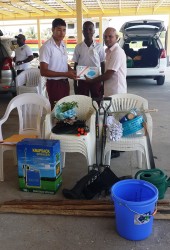 Students of Rosignol Secondary School receiving the items