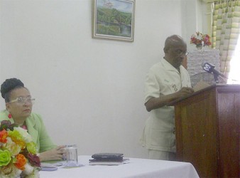 Mayor of Georgetown, Hamilton Green speaking at a press conference in the National Library with Deputy Mayor, Patricia Chase-Green