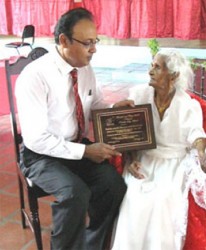 Sogaree Jattan, pictured in 2008, receiving the Citizens for a Better Trinidad and Tobago’s Republic Day award in 2008, from his president Harrack Balramsingh, who also died recently. 