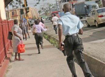  Police were among those who ran towards Brickdam when shouts emanated from that direction that constable Devin Singh had left the courthouse via the Brickdam exit.   