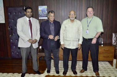 President Donald Ramotar (third from left) with (from left) Minister of Tourism (ag) Irfaan Ali, Roraima Airways CEO Capt. Gerry Gouveia and Senior Vice President Business Operations Dynamic Airways Tom Johnson. (GINA photo) 