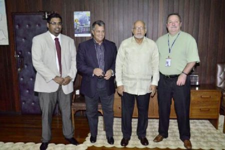 President Donald Ramotar (third from left) with (from left) Minister of Tourism (ag) Irfaan Ali, Roraima Airways CEO Capt. Gerry Gouveia and Senior Vice President Business Operations Dynamic Airways Tom Johnson. (GINA photo)