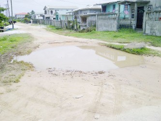 A sorry road in Kaneville, Grove