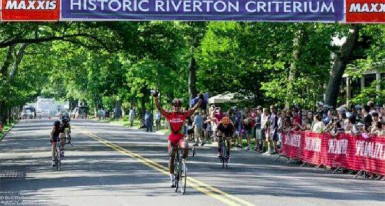 Alanzo Greaves crosses the finishes line in the Riverton Criterium event last year.