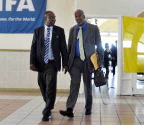 U-turn! Odinga Lumumba, right says he is willing to work along with GFF president Christopher Matthias following FIFA’s ruling of a few days ago. 