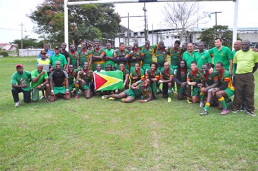 New Southern Zone Champs! The National Men’s 15s Rugby team pose for a photo following their 15-8 victory over Trinidad yesterday. 