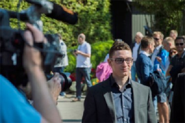 Fabiano Caruana, the 21-year-old American-born Italian chess grandmaster, takes a walk following his successive victories at the Norway Super-Tournament. Seven of the world’s highest ranked grandmasters, the elite masters of “tactics and strategy,” are participating in the tournament. Caruana boasts a perfect score from the two games that he played, ahead of world champion Magnus Carlsen. In 2007 Caruana became the youngest grandmaster in both America and Italy at 14 years, 11 months and 20 days and is ranked number four in the world after Carlsen, Aronian and Grischuk. Carlsen was asked to comment on Caruana’s success in the tournament. He answered:  “It’s time to stop him.”