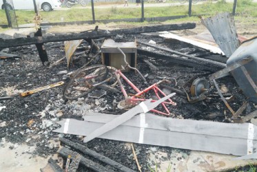 The alleged arsonist’s bicycle among the ruins 