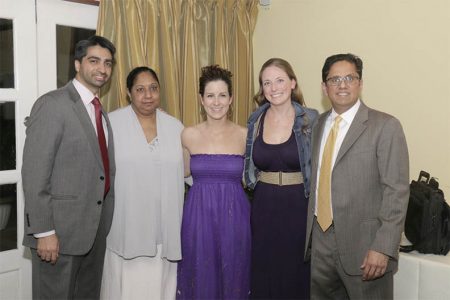 Dr. Rajiv Jauhar (right) stands with his team from the Long Island Jewish Hospital at Cara Lodge on Friday. 
