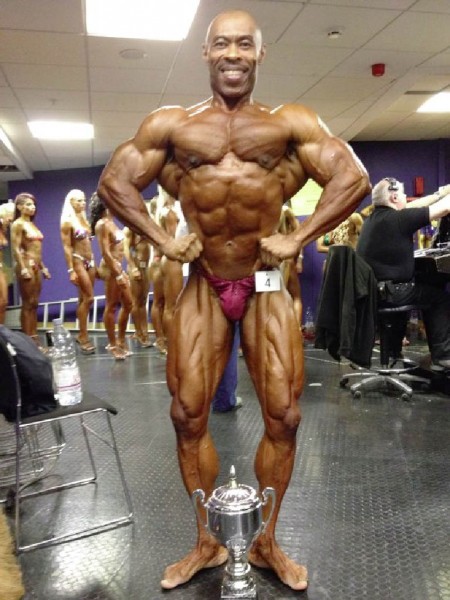 Hugh Ross posing with his second place trophy at the 31st NABBA World Bodybuilding Championships Saturday at the Belfast Waterfront in Northern Ireland.