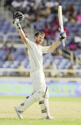 James Neesham celebrates his second test century yesterday. (Photo courtesy of WICB media) 