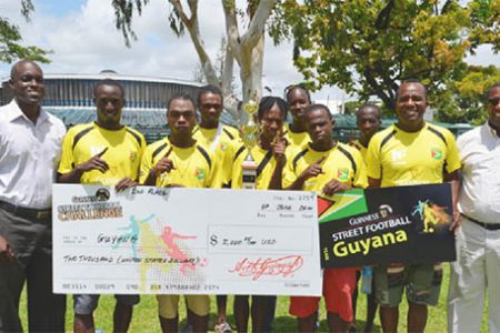 The Guyana team with Lee Baptiste, Guinness Brand Manager, Mortimer Stewart, Outdoor Events Manager of Banks DIH and Referee Wayne Griffith.
