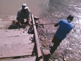 T&HD workers fixing the steps (T&HD photo)