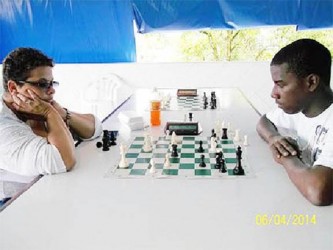 Cuban-Guyanese Maria Thomas opposes Owen Mickle at Sunday’s one-day rapid chess tournament which was sponsored by ECI and held at Friendship, on the East Bank. Maria has become a fixture in local chess, always striving to improve her game and providing encouragement to the younger players. She looks forward to one day participating in the fabulous chess Olympiad, where over 140 countries compete for honours every two years.