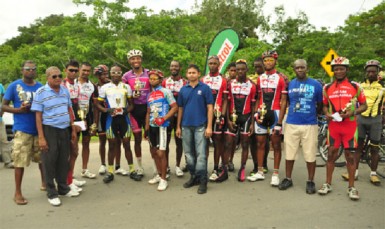 Yesterday’s prize winner’s posing with their spoils. (Orlando Charles photo)