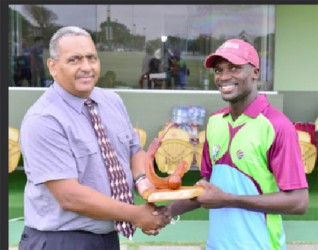 Match referee Colin Bowen presents the Man of the Match award to Jonathan Carter. (Photo courtesy of WICB media) 