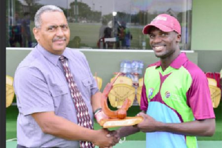 Match referee Colin Bowen presents the Man of the Match award to Jonathan Carter. (Photo courtesy of WICB media)