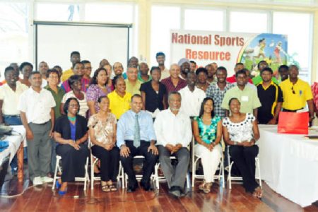 The 42 participants of the three-day Sports Management Workshop along with Prime Minister, Samuel Hinds, Minister of Sport, Frank Anthony, Cathy Samuels, Grace Jackson and June Rudder pose for a photo opportunity. (Orlando Charles photo) 