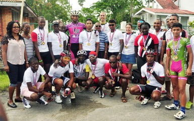 Yesterday’s top performers take a photo opportunity following the National Cycling Championships. (Orlando Charles photo) 