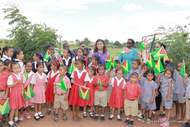 Education Minister Priya Manickchand (standing at centre) with Region Nine pupils. (Ministry of Education photo)