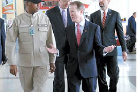Flashback:  United States Assistant Secretary of State William Brownfield, second from right, chats with Inspector Matthew Ovid, left, head of the Canine Unit, at the Piarco International Airport during his visit to T&T in April, where he attended the Association of Caribbean Commissioners of Police Conference at the Hyatt Regency, Port-of-Spain. With them are Keith Gilges political chief, right, and James Story, director of International Western Hemisphere Programmes. PHOTO COURTESY US EMBASSY, PORT-OF-SPAIN 