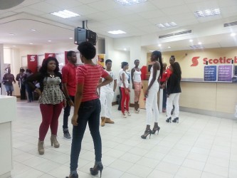 The models performing the skit.