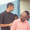 School teacher Ramesh Angatiah, right, as he appeared in the Rio Claro Magistrates’ Court yesterday on two charges of indecent assault against a 16-year-old boy.