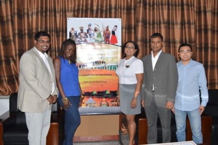 From left are: Minister of Tourism (ag) Irfaan Ali, Melissa “Vanilla Roberts, Guyana Festival Coordinator Tameca Sukhdeo- Singh and Representatives of Windsor Estate and Baishan Lin at the handing over of a cheque towards the Guyana Festival. (GINA photo)