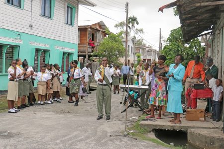 Members of the Berea Seventh-day Adventist Church delivering their message on Garnett Street, Albouystown on Saturday.