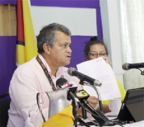 Roraima CEO Gerry Gouveia holds the approval letter yesterday at a press conference at Duke Lodge in Georgetown.  