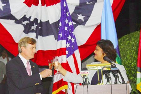 Acting Foreign Affairs Minister Priya Manickchand toasting with outgoing US Ambassador Brendt Hardt following the ruckus sparked by her remarks.
