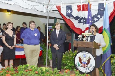 US Ambassador Brendt Hardt (second from right), Deputy Chief of Mission Bryan Hunt and an embassy official listening as Acting Foreign Affairs Minister Priya Manickchand spoke.  