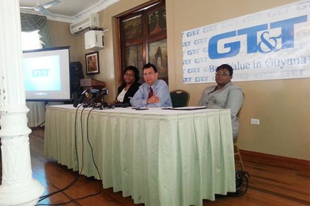 (From left to right) Allison Parker, GT&T CEO R.K. Sharma and Pamela Briggs at the GT&T launch of its “MyAccount” e-billing service.