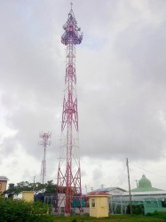 A tower once intended for the Plaisance Community Centre ground not stands near the Vryheid’s Lust Secondary School on the East Coast of Demerara. It is one of 54 signal towers erected for the E-Governance, which E-Governance Project Director Alexi Ramotar now says will be completed by the end of August after numerous delays. See story on page 10.  (Photo by Chevy Devonish) 