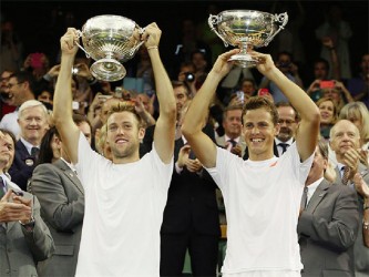 Jack Sock (left) and Vasek Pospisil celebrate their Wimbledon win