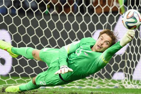 Goalkeeper Tim Krul of the Netherlands saves the last penalty shot against Costa Rica during a penalty shootout. (Reuters/Marcos Brindicci)